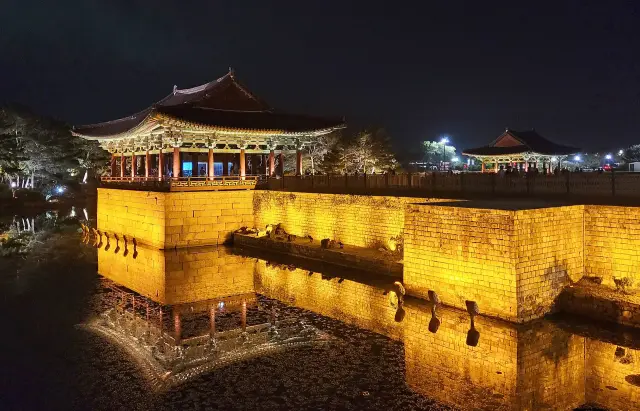 Gyeongju tombs and pond: Daereungwon by day, Donggung and Wolji at dusk, travel inspiration