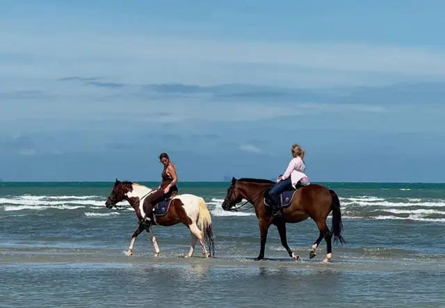 Horseback riding along the Lipa Noi shoreline
