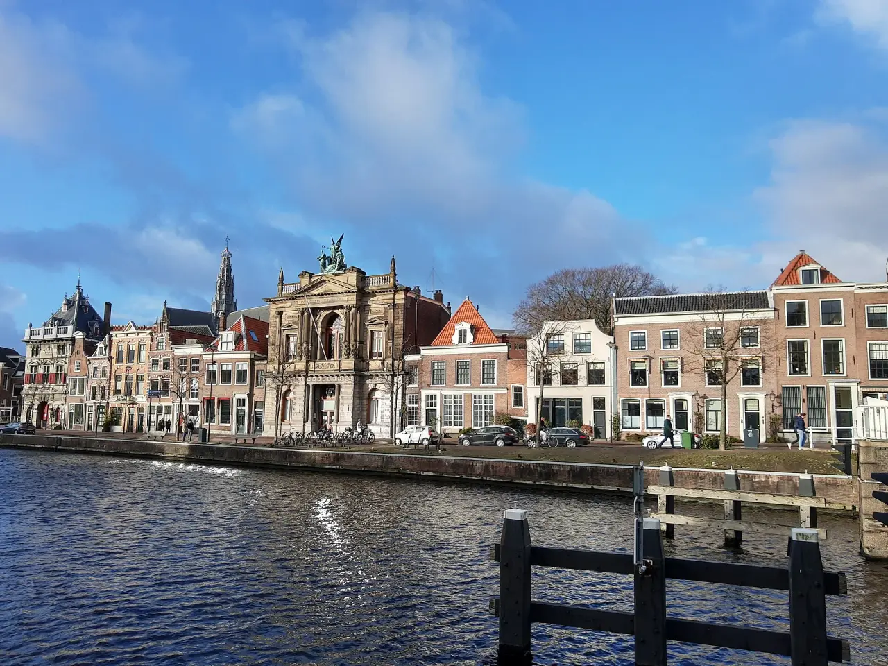 Teylers Museum and neighboring gabled houses beside the Spaarne in Haarlem