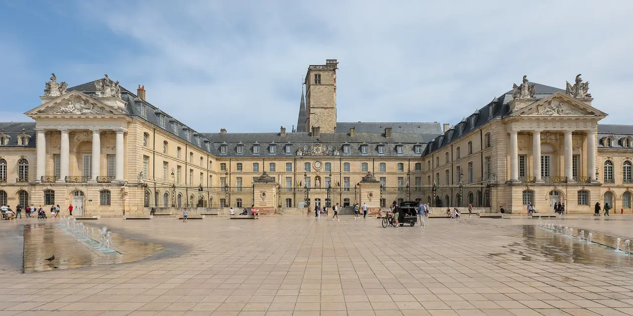 The Tour Philippe le Bon and central ducal-palace facade across Place de la Libération in Dijon