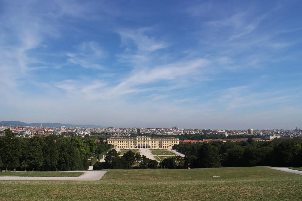 Schönbrunn Palace and its gardens seen from a hillside in Vienna