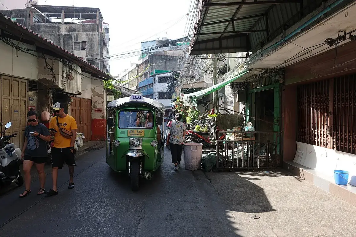 Tuk-tuk in a historic lane in Talat Noi, Bangkok
