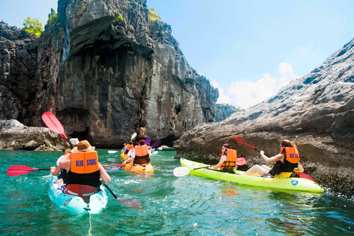 Kayaking beside Ang Thong’s limestone cliffs