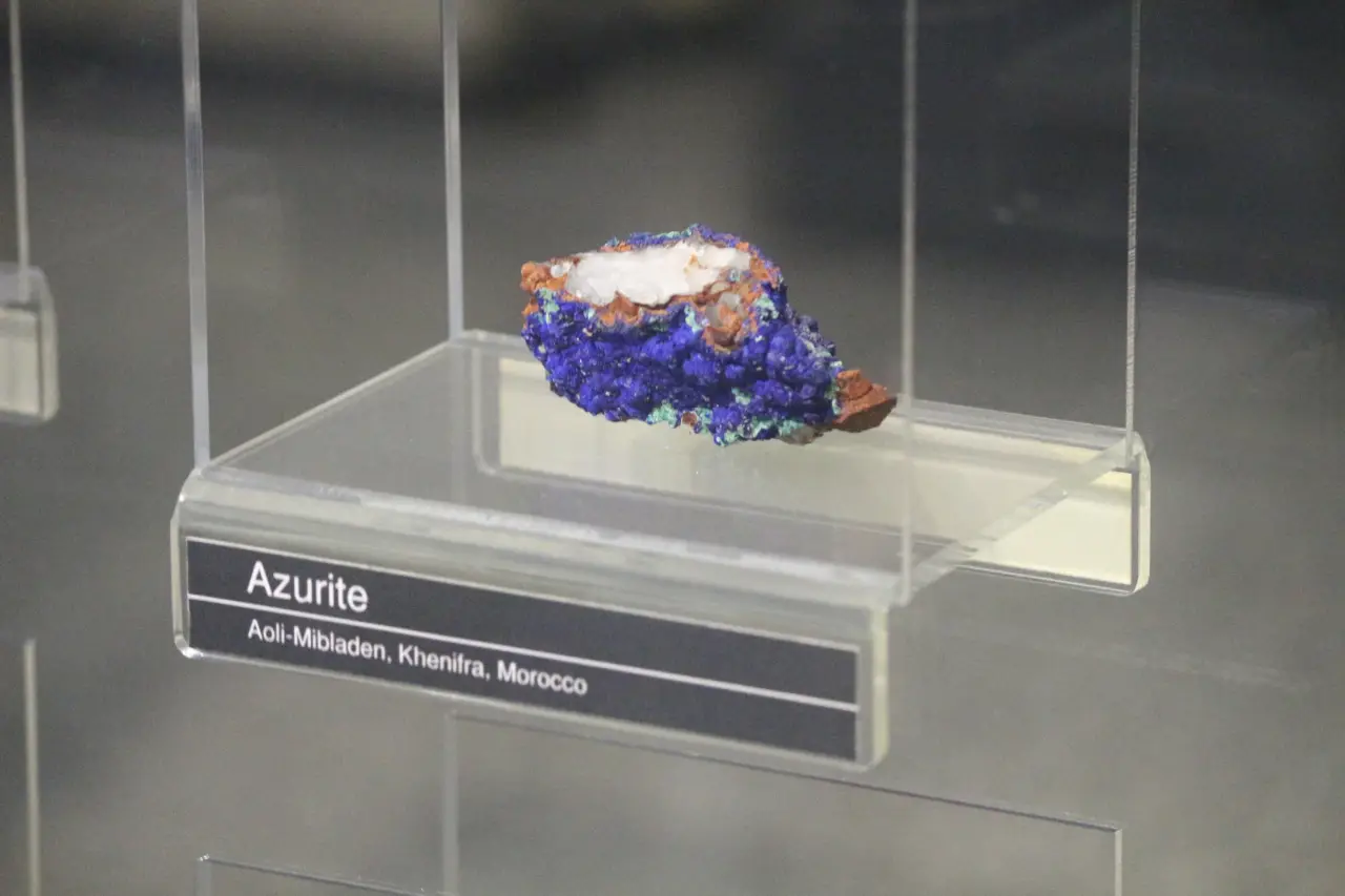 A vivid blue azurite specimen displayed inside Museum Geologi in Bandung, Indonesia.