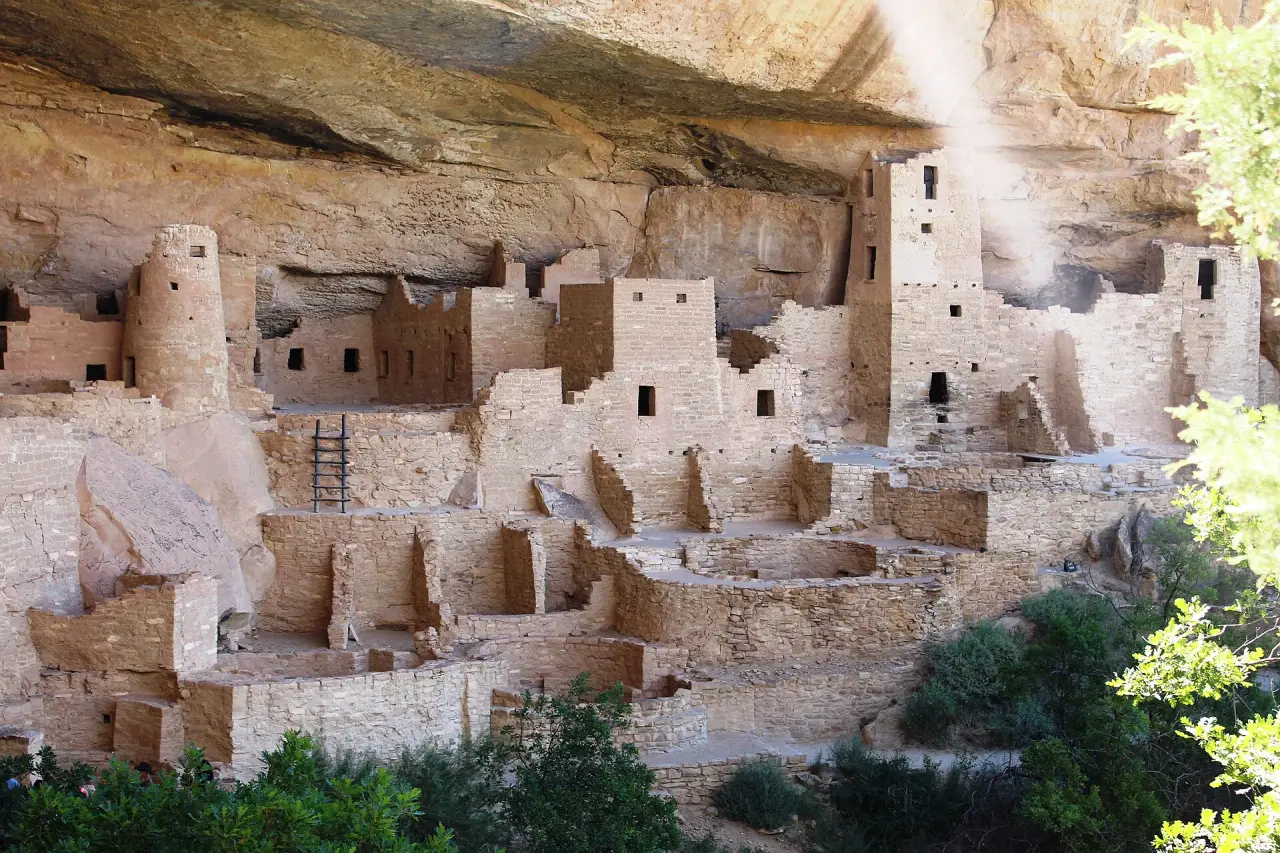 Stone rooms and towers beneath the cliff overhang at Cliff Palace in Mesa Verde National Park