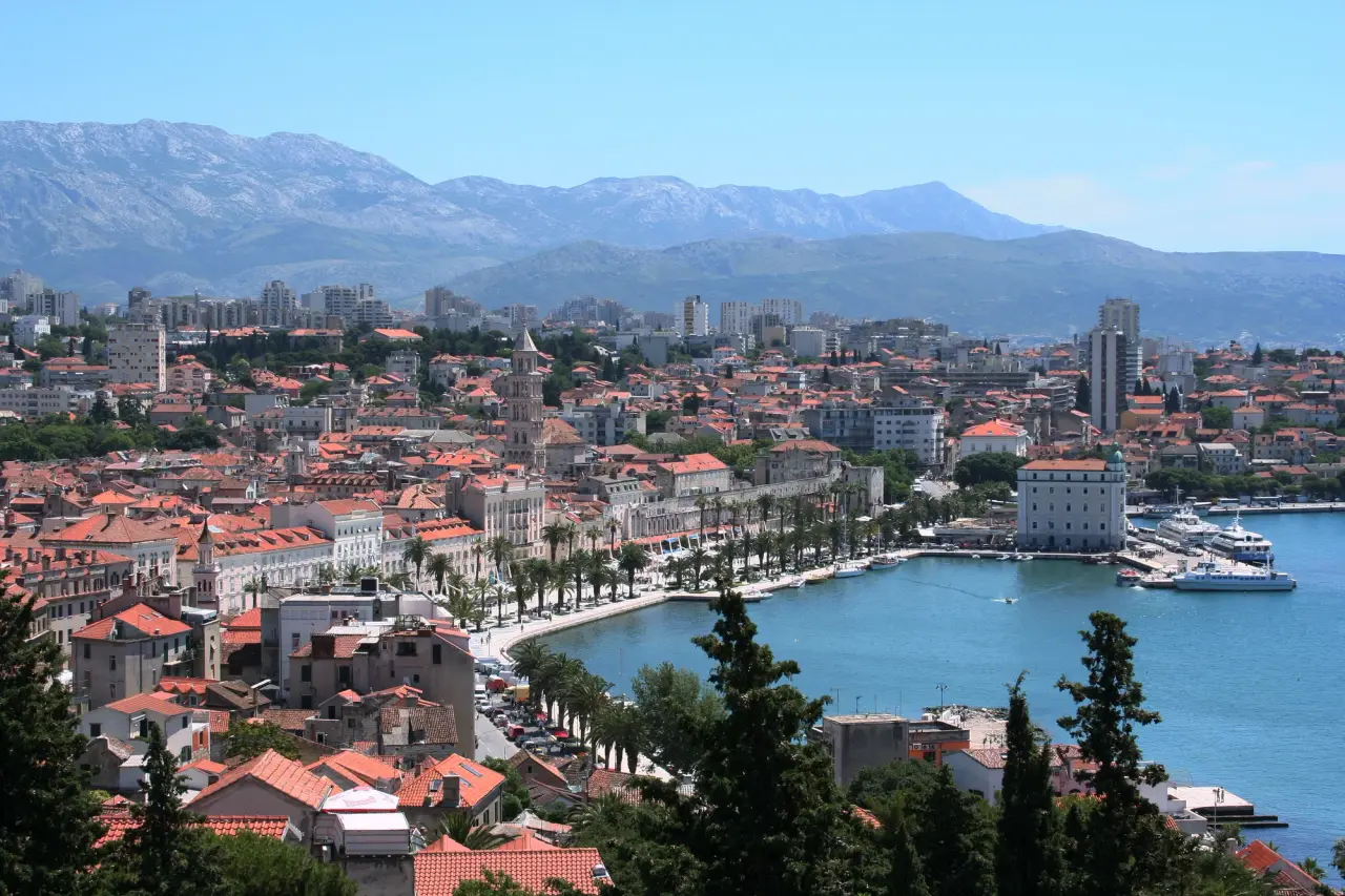 The red roofs of Split’s historic palace quarter and the waterfront seen from Marjan hill