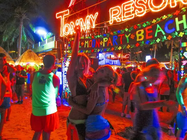 Full Moon Party lights and painted signs at Haad Rin