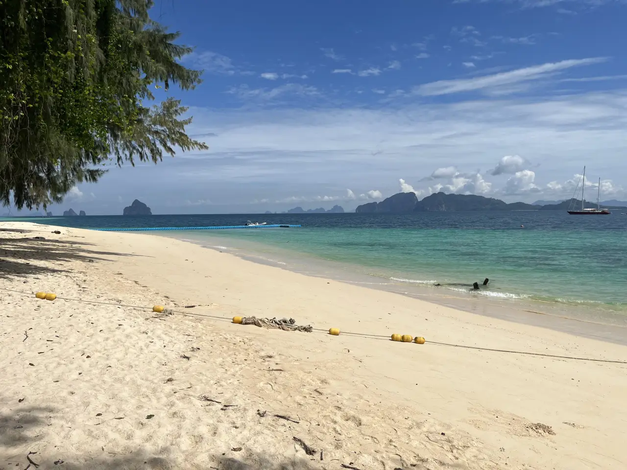 Bright white sand and turquoise water along Ko Kradan beach in Trang, Thailand
