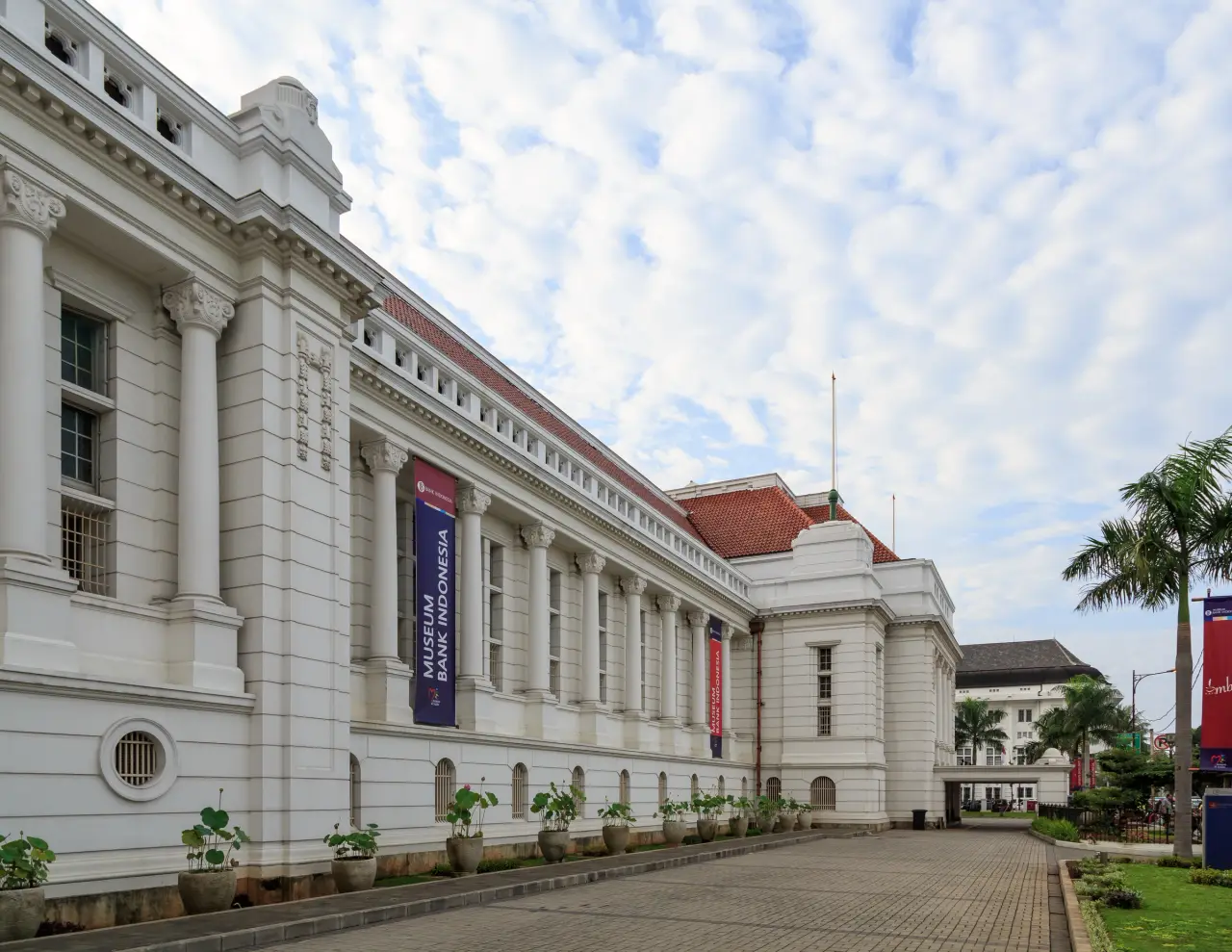 White colonnaded facade of Museum Bank Indonesia in Jakarta Old Town.