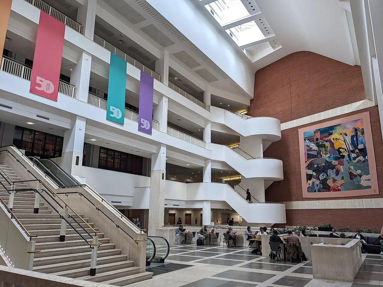 The bright entrance hall and staircase of the British Library in London