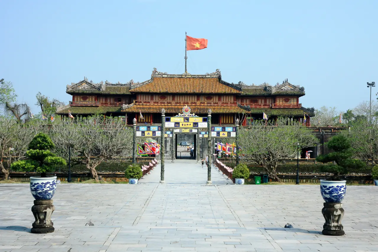 The Noon Gate and flag at Hue Imperial City in Vietnam.