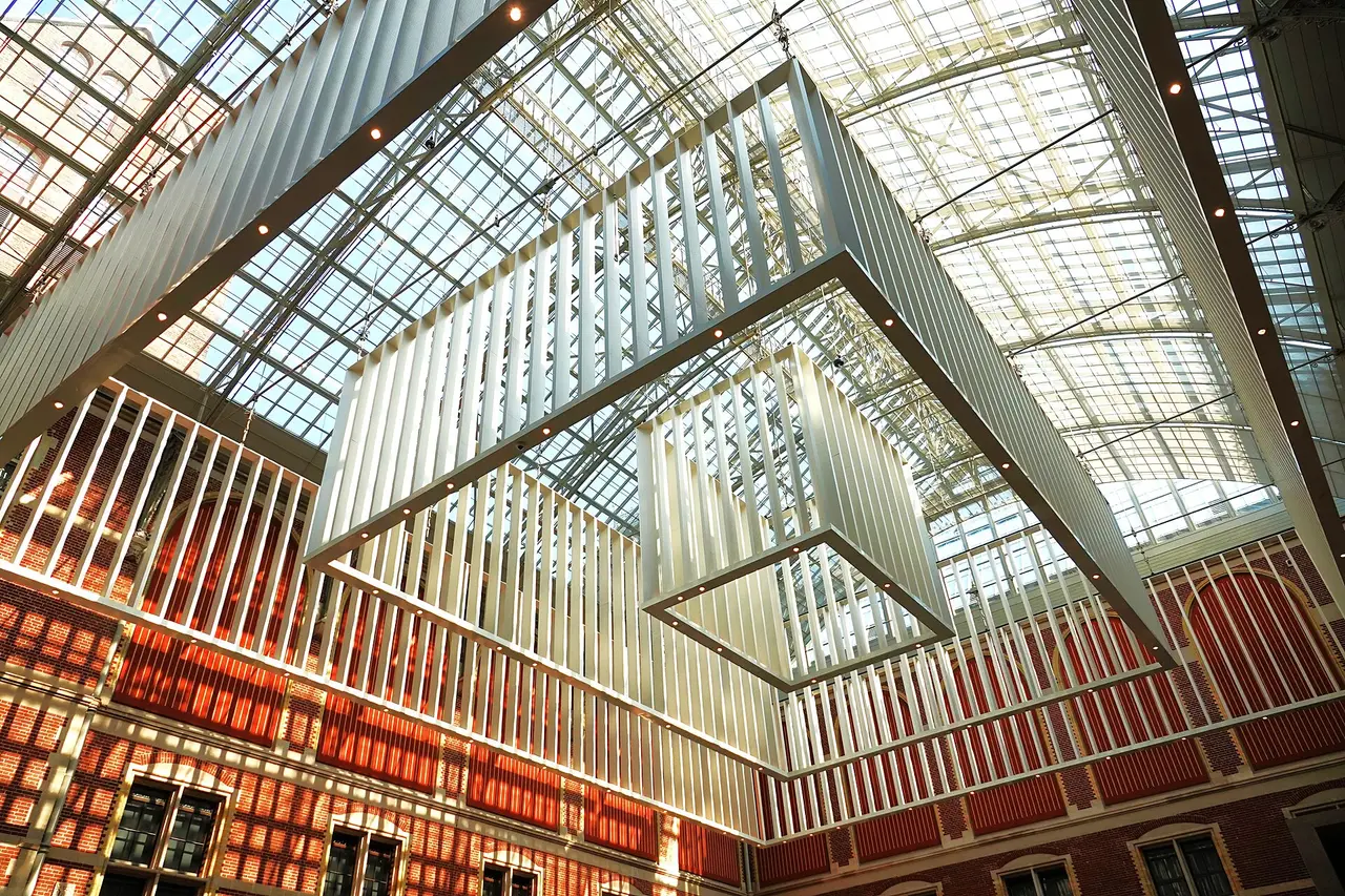 The glass roof and structural patterns above an interior courtyard at the Rijksmuseum in Amsterdam.