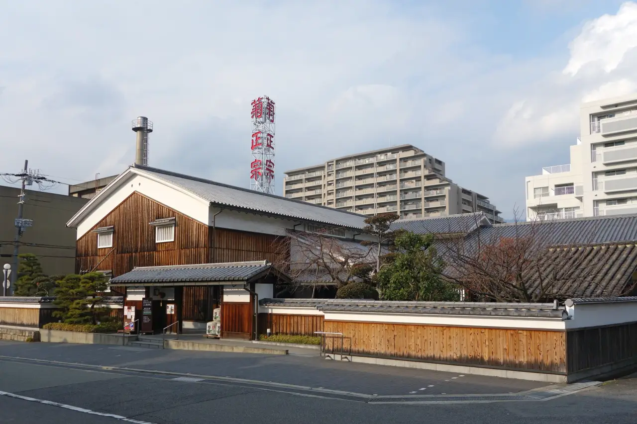 Traditional wooden entrance and sign of Kiku-Masamune Sake Brewery Museum in Kobe