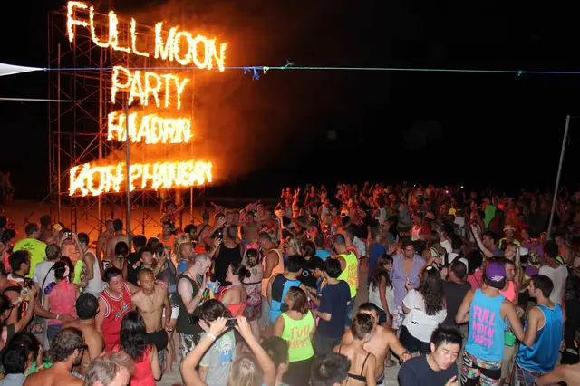 Haad Rin beach beneath the Full Moon Party sign